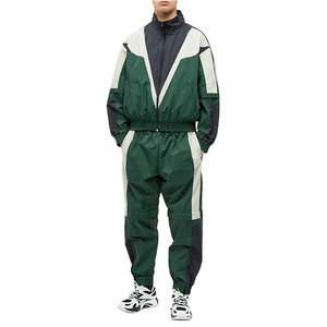 Elite men's dual-tone tracksuits. Engineered with sleek <b>zip</b>-<b>up</b> <b>jackets</b> and matching joggers for ultimate gym style. - Product Image 2