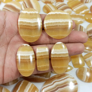 Cabochons de calcite jaune naturelle polie en gros pour la fabrication de bijoux - Product Image 1