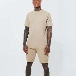 Ensemble de t-shirt à manches courtes bleu uni pour homme avec short assorti, coupe ajustée, sportif, col rond, tricoté, séchage rapide - Product Image 1