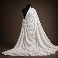 Tissu en mousseline de coton premium brodé à la dentelle florale ajourée pour robes, kurtis, dupattas et confection de vêtements de mariage pour femmes - Exportation