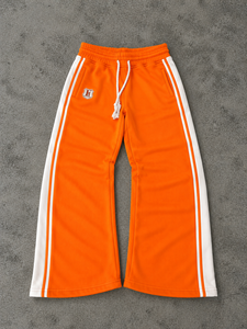 Pantalon de survêtement large pour homme personnalisé, avec bande latérale contrastante, en molleton orange, coupe ample, style streetwear, pour le sport, vente en gros - Product Image 1