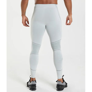 Leggings de sport modernes pour hommes, coupe ajustée, pantalons de performance pour l'entraînement, légers, compressifs et athlétiques. - Product Image 2