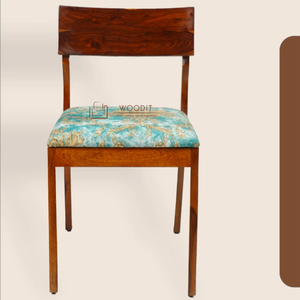 เก้าอี้รับประทานอาหารสไตล์มินิมอลทันสมัยพร้อมพนักพิงโค้งมน ฐานไม้เนื้อแข็ง หุ้มด้วยผ้าพิมพ์ลายดอกไม้ พร้อมเบาะนั่งนุ่มสบาย - Product Image 1