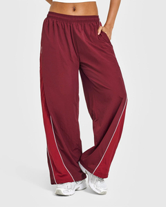 Oferta Especial: Chándal Cortavientos Unisex Personalizado de Alta Calidad, Pantalón Jogger con Cierre, Nailon Ecológico, Transpirable e Impermeable - Product Image 3