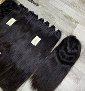 Vente en gros d'extensions de trame à la machine à double traction vietnamiennes brutes faisceaux de cheveux humains HD perruques à fermeture en dentelle - Product Image 2