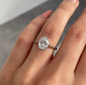 Bague de fiançailles pour femme en or jaune 14 carats avec diamant taille ovale, style classique, couleur D, pierre naturelle certifiée IGI, RAHA JEWEL RJ491 - Product Image 1