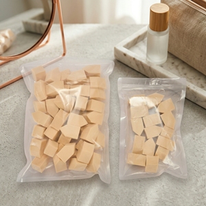 [K-ESSENTIALS] Éponge de Maquillage Sans Couture pour un Teint Parfait, Beige, Lot de 50, Applicateur de Fond de Teint Lisse - Product Image 1