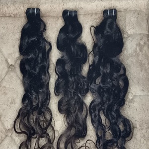 ผมแท้ธรรมชาติอินเดียแบบ Remy ยี่ห้อ GK NATURAL แบบมัดเป็นช่อ สีดำธรรมชาติ  แบบ Single Drawn ปลายหนา  ถักด้วยเครื่องจักรแบบ Double Weft น้ำหนัก 100 กรัม/ชิ้น ขายส่ง - Product Image 1