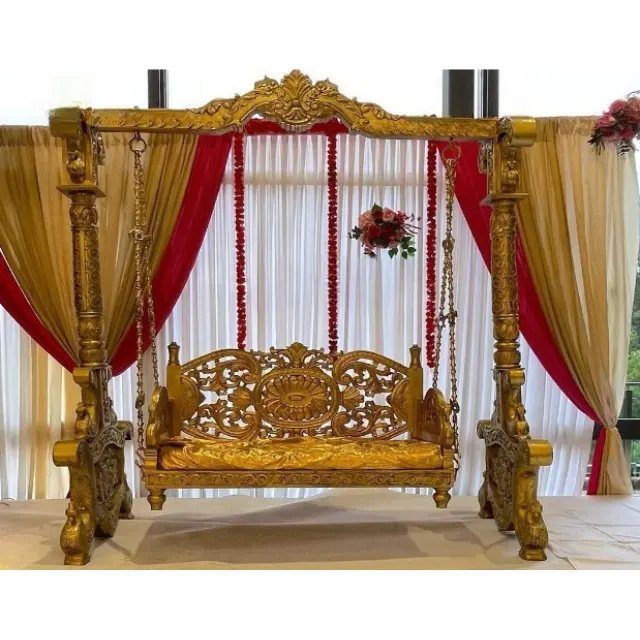 Wedding swing for the beautiful bride and groom to sit and use it in every event of wedding function and decoration .