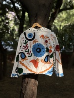 Veste pull en velours et coton brodée Sujani faite à la main pour femme, motif œil porte-bonheur et cœur, design multicolore matelassé, automne-hiver
