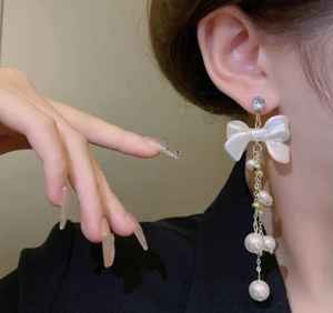 ต่างหูห้อยประดับมุกสีขาวรูปโบว์สไตล์เกาหลี ดีไซน์หรูหรา สำหรับผู้หญิง ราคาส่งถูก - Product Image 4