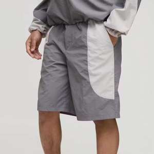 Ensemble de survêtement en nylon personnalisé de haute qualité pour hommes, coupe-vent multicolore tendance - Product Image 3