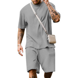 Conjunto de camiseta y pantalones cortos de algodón acanalado blanco para hombre, cuello redondo, informal, para verano, transpirable, de punto, color sólido - Product Image 3