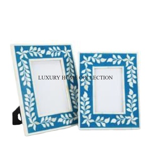 Cadre photo en bois avec vadrouille fabriqué à la main avec des détails subtils au design élégant parfait pour encadrer des souvenirs personnels de manière chic - Product Image 1