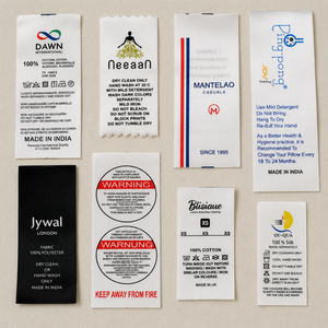 Etiquetas de Cuidado de Ropa Impresas Personalizadas de Primera Calidad con Instrucciones de Lavado, Etiquetas de Tela de Satén para Marcas de Ropa y Textiles - Product Image 1
