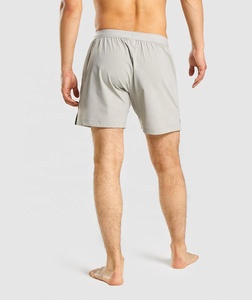 Gran oferta de pantalones cortos deportivos para hombre, pantalones cortos de entrenamiento de gimnasio de secado rápido con bolsillo, patrón sólido teñido liso, estilo informal ecológico - Product Image 2