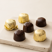 Produits les plus vendus : bonbons en forme de demi-œuf au chocolat noir en boîte personnalisée pour les importateurs en gros