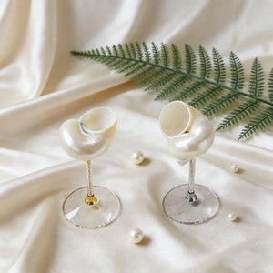 Verres à vin conçus avec des motifs complexes de coquillages et un support en verre qui reflètent la beauté naturelle de l'océan - Product Image 4