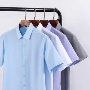 เสื้อเชิ้ตแขนสั้นผ้าฝ้ายแท้ 100% ทรงเข้ารูปสำหรับผู้ชาย ระบายอากาศได้ดี ผ้าทวิลล์ แฟชั่นฤดูร้อน สวมใส่สบายๆ รับผลิตตามแบบ (OEM) ส่งออก กระดุมทรงแตร - Product Image 1