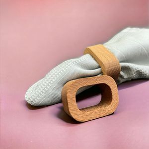 Anillo para servilletas de madera duradero, diseñado para un uso prolongado en mesas de comedor de hogares, restaurantes y cafeterías. - Product Image 2
