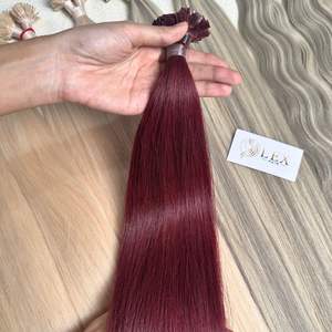 Extensions de cheveux humains russes à pointe en U, double trame, cuticules intactes, ondulés naturels, à kératine, vente en gros - Product Image 1