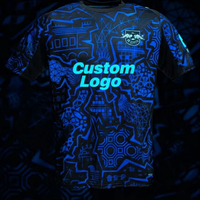 Seragam Jersey Sublimasi Kustom Soccer Glow Kingdom Lengan Pendek Cepat Kering 100% Poliester Anti-Bakteri Perlindungan UV Hitam