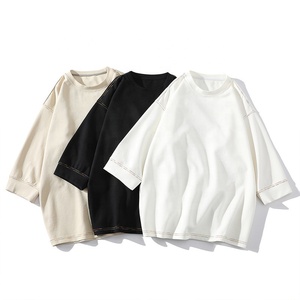 Camiseta unisex de mezcla de algodón con costuras en contraste, manga tipo brazalete, hombros caídos, cuello redondo, camiseta de manga tres cuartos para hombre y mujer - Product Image 1