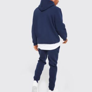Ensemble de survêtement oversize pour homme, style streetwear, comprenant un sweat à capuche coupe ample et un pantalon évasé, en coton lourd 100% de haute qualité. - Product Image 5