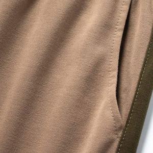 Chándal Unisex personalizado de alta calidad Calentamiento Color sólido 100% algodón Diseño de logotipo personalizado Precio al por mayor - Product Image 6