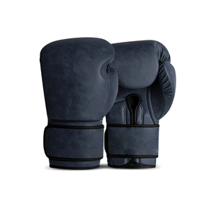ถุงมือซ้อมมวยไทยและคิกบ็อกซิ่ง OEM ODM ดีไซน์ตามสั่ง - Product Image 1
