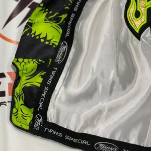 กางเกงมวยไทยมืออาชีพแบบใหม่ล่าสุด ปักโลโก้ ออกแบบเองได้ พิมพ์โลโก้แบรนด์ตามสั่ง กางเกงคิกบ็อกซิ่งสำหรับฝึกซ้อม MMA - Product Image 4