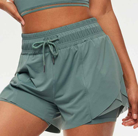 Shorts de sport 2-en-1 en molleton pour femme, anti-plis, séchage rapide, respirants, écologiques, pour yoga et fitness – Vente en gros OEM de haute qualité