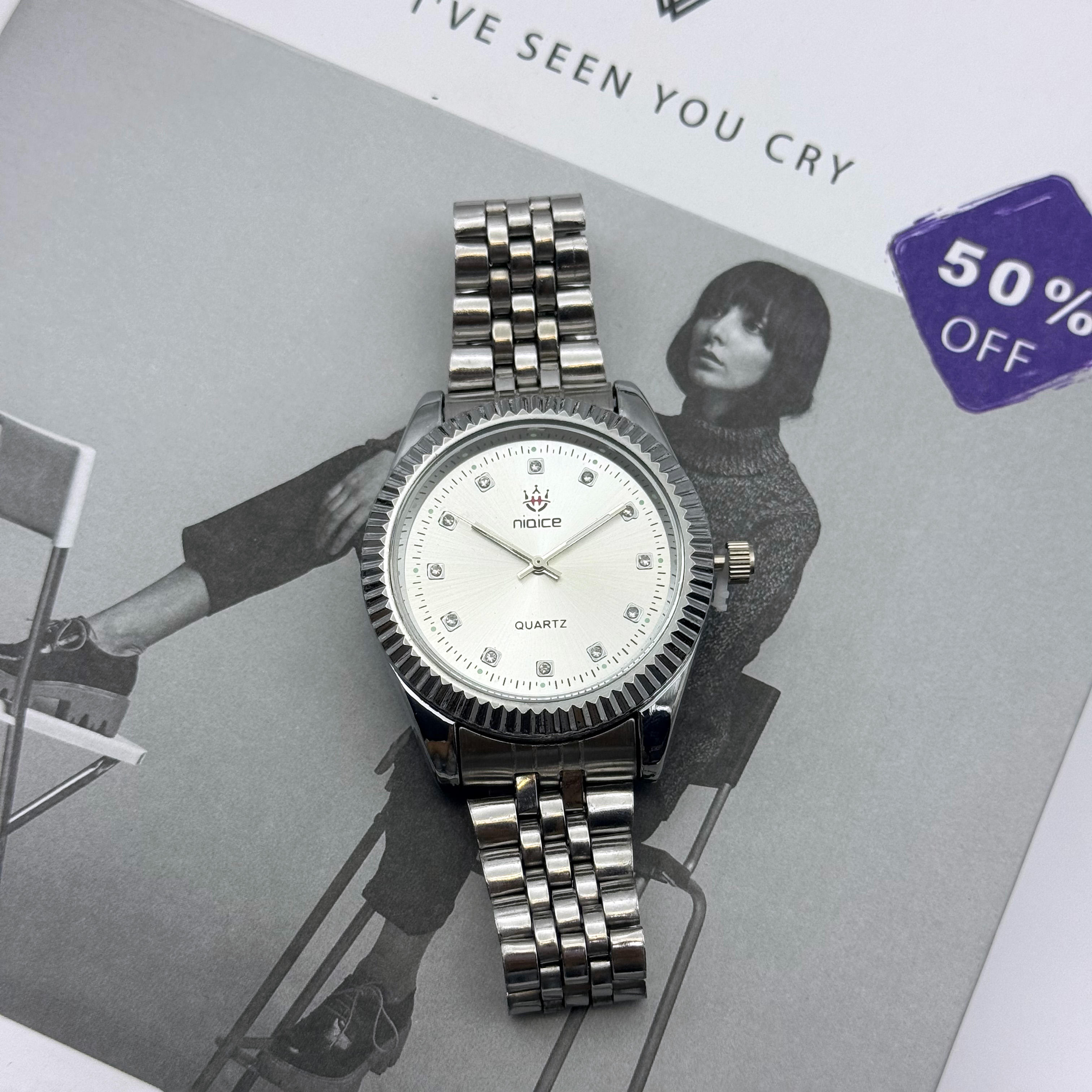 Silver belt and white plate