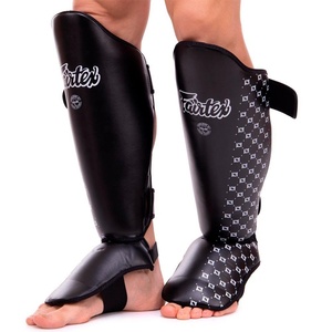 Protège-tibias Fairtex de qualité supérieure en cuir véritable, couleur et logo personnalisables, sangles réglables à scratch pour Muay Thai - Product Image 2