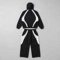 Ensemble de survêtement coupe-vent en nylon enduit personnalisé avec col montant et poignets élastiques, et ensemble de tenue de pluie avec passepoil personnalisé pour les programmes d'équipe