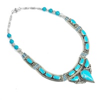 Collier pendentif classique en argent tibétain avec serti clos et pierre précieuse turquoise pour fiançailles, mariage et anniversaire