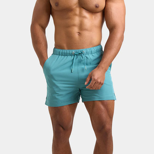 Shorts de bain mi-longs pour homme, légers, en spandex et polyester, unis, imperméables, avec taille élastique et poches latérales - Product Image 4
