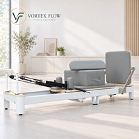 Machine de Pilates pliable de qualité professionnelle avec barre de pieds à 7 positions et structure en aluminium pour salles d'entraînement partagées