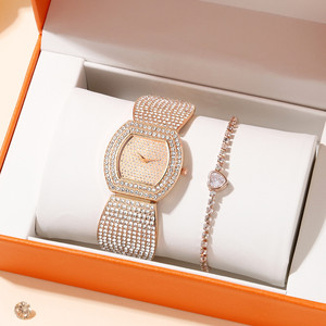9773 Novedades 2022: Set de Reloj y Pulsera para Mujer, Relojes de Moda en Oro Rosa con Brillantes y Pulsera de Eslabones Cubanos - Product Image 1