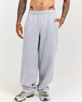Pantalon de jogging en coton 100% 345 GSM avec logo personnalisé, coupe large élastique, épais, pour homme, décontracté, mi-hauteur, disponible en OEM