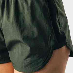 Diseño ergonómico, ajuste de alto rendimiento, tejido ligero y transpirable para máxima comodidad en el movimiento, pantalón corto informal para mujer - Product Image 3