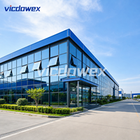 VICDOWEX Maison préfabriquée de luxe intégrée en forme de T avec fenêtres en aluminium pour usage commercial et bureautique contemporain