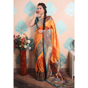 ผ้าไหมปาธานีสีส้มลายวีรุกษ์  งานทอซารี  ชุดราตรีหรูหรา  ผ้าทอชั้นดี น้ำหนัก 650 กรัม - Product Image 2