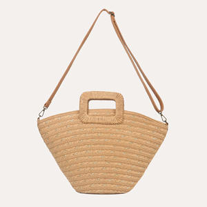 Ignite your daily fashion sense with this trendy Natural yarn bag styled with a spacious shape and a rigid <b>top</b> handle now - Product Image 1