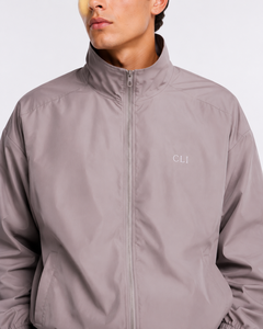 Ensemble de survêtement deux pièces unisexe en nylon personnalisé, coupe-vent léger à fermeture éclair intégrale et pantalon large, avec logo brodé OEM, vêtements de sport - Product Image 2