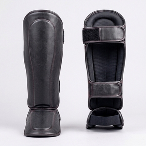 สนับแข้ง PU แบบยืดหยุ่น ปรับได้ด้วยแถบตีนตุ๊กแก อุปกรณ์ป้องกันสำหรับการชกมวยระดับมืออาชีพ สำหรับผู้ใหญ่ 男女 สนับแข้ง รุ่น 2026 - Product Image 5