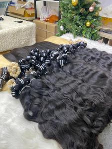 Vente en gros paquet extension de cheveux ondulés naturels trame cheveux humains vierges vietnamiens de haute qualité cheveux humains ondulés de couleur naturelle - Product Image 2