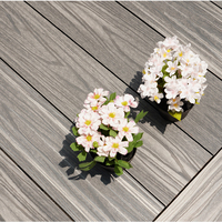 Planches de terrasse en composite bois-plastique (WPC) modernes, imperméables et antidérapantes pour jardin