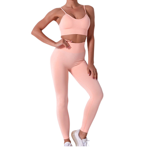 Conjunto de 2 piezas para mujer: Top de yoga sin mangas con cuello redondo y tirantes ajustables, y leggings de cintura alta sin costuras, de poliéster/algodón elástico. - Product Image 1