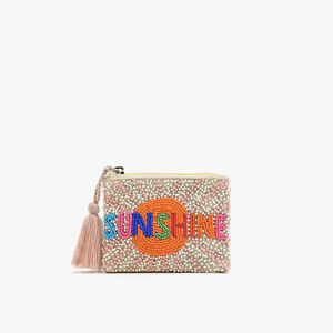 Monedero artesanal con cuentas de semillas y estampado de vaca, hecho a mano en India - Product Image 1